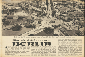 Alte Zeitung mit Schwarz-Weiß-Foto einer Stadtlandschaft, Text und gedruckten Schlagzeilen.