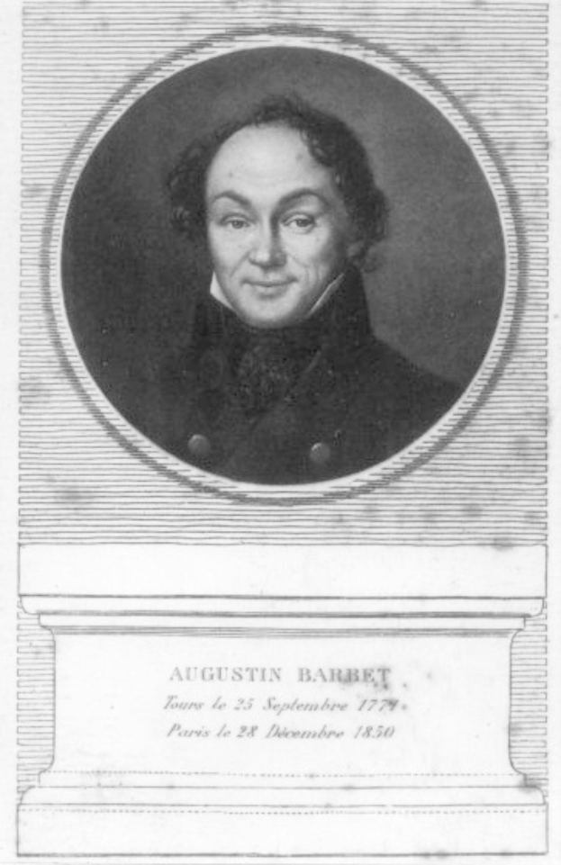 Ein Schwarz-Weiß-Porträt von Augustin Barbet, einem französischen Komponisten, der einen schwarzen Anzug und ein weißes Hemd trägt und einen ernsten Gesichtsausdruck hat.