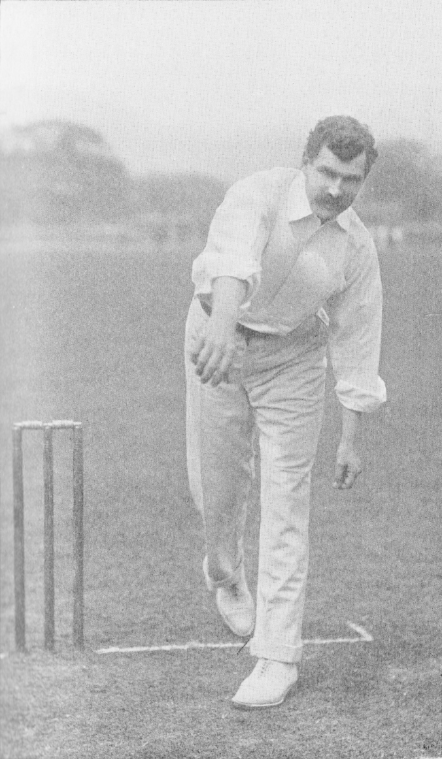 Ein Mann in weißer Cricket-Uniform spielt in einem Match mit Wickets auf dem Boden, Bäumen und Himmel im Hintergrund, mit dem Text "Cricket-Spieler des Jahres" unten.