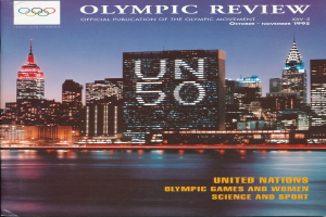 Ein Buch mit dem Titel "Olympic Review Official Publication of the Olympic Movement" liegt auf einer flachen Oberfläche, mit einer Stadtlandschaft mit Gebäuden, Lichtern und Wasser auf dem Cover, und der Text "United Nations Olympic Games and Women Science and Sport" ist ebenfalls sichtbar.