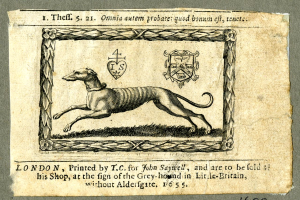 Ein altes Buch mit einer Zeichnung eines Windhunds in Laufposition, Kopf hoch erhoben und Ohren gespitzt, mit dekorativem Text auf dem Deckel.