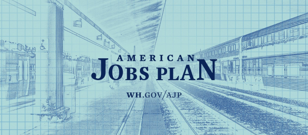 Blaupause einer Bahnhof mit der Aufschrift "American Jobs Plan" mit einem Zug auf der rechten Seite und Bahnschienen daneben.
