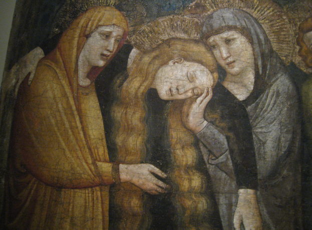 Ein abstraktes Gemälde mit verschiedenen Formen und Farben auf einer Leinwand.