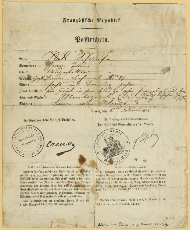 Altes vergilbtes deutsches Regierungsdokument mit einem kreisrunden schwarzen Randstempel und schwarzer Tintenbeschriftung.